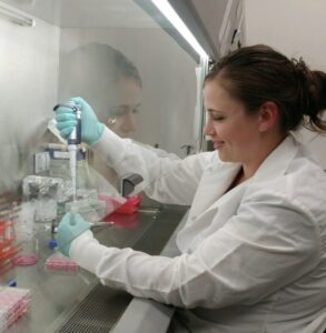 a woman working in a laboratory