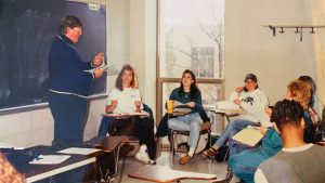 1990s classroom photo featuring Professor Wilson Watts and students