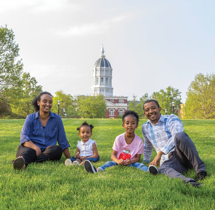 Ethiopian mother, father and two children on Carnahan Quadrangle